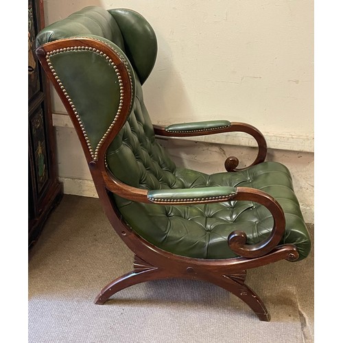 39 - Chesterfield Wing Back Leather Elbow Chair.