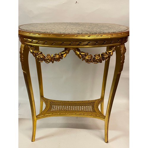 47 - French Louis XVl Style Oval Marble Top Table In Gilt Wood. 70 x 50 x 75 cms