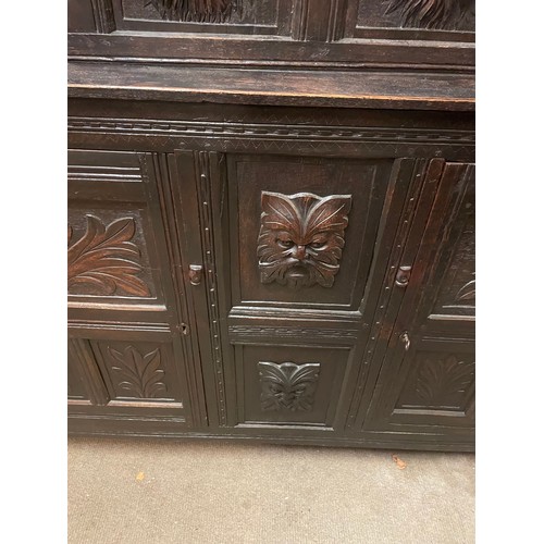 54 - Two Piece Continental Court Cupboard With Carved Wood Panels.162 x 170 x 56 cms