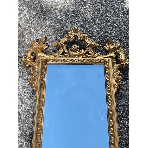 70 - Gilt Wood Decorated Mirror. 93 x 51 cms