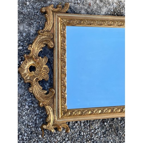 70 - Gilt Wood Decorated Mirror. 93 x 51 cms