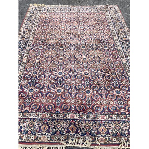 99 - Large Hand Made Eastern Ground Rug. 285 x 175 cms