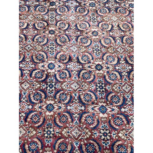 99 - Large Hand Made Eastern Ground Rug. 285 x 175 cms