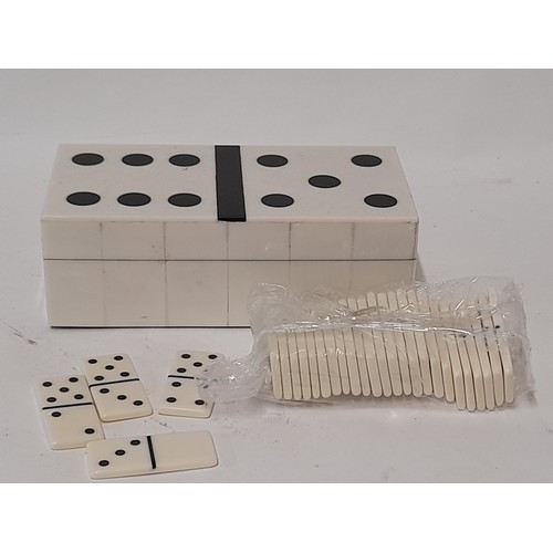 30 - Box in the form of a Domino, contains domino's, 15cm x 8cm x 6cm