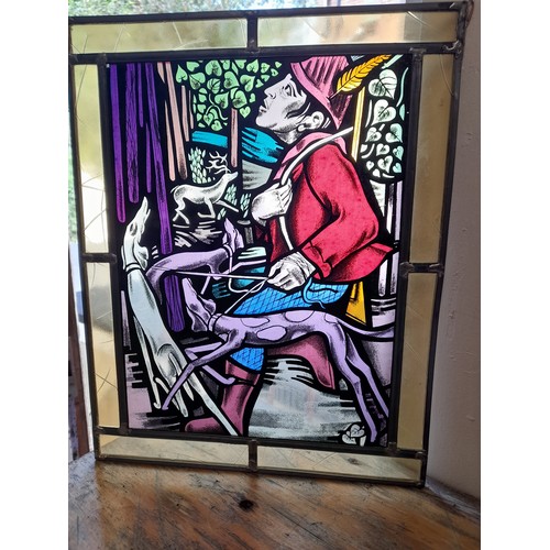 37 - Lead And Stained  Glass Window Panel of a man with dogs, 33cm x 42cm