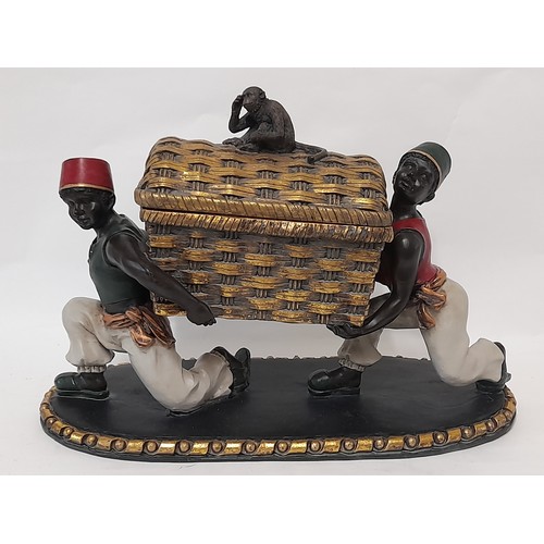 38 - Table centre piece of Blackamoor figures carrying a basket with removable lid with monkey finial, 35... 