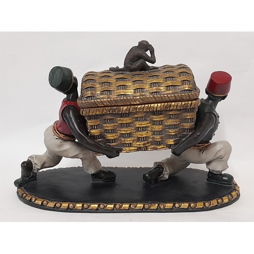 38 - Table centre piece of Blackamoor figures carrying a basket with removable lid with monkey finial, 35... 