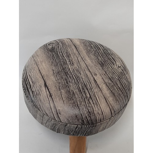 63 - 3 Leg stool with wood effect upholstery, 25cm high x 30cm diameter