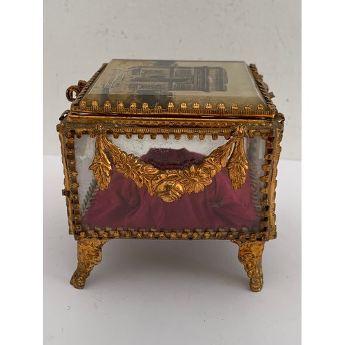 116 - Antique Gilt Brass And Glass Jewellery Casket Having L’Arc De Triomphe, Paris To The Top
8 x 8 x 7.5... 