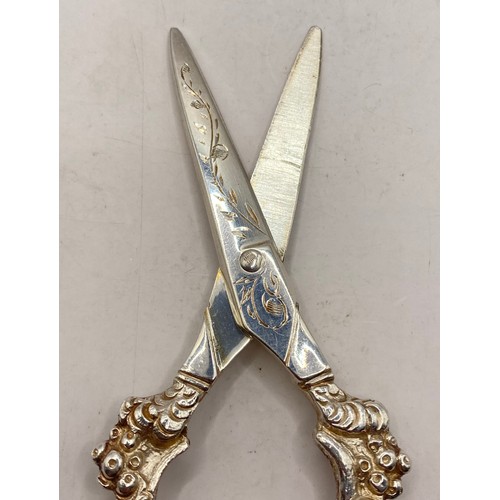 253 - Two Grape Decoration Hallmarked Silver Scissors. Weight 5.687 Oz. Largest 16cm Length