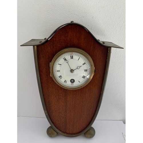 299 - Vintage Brass And Wood Mantel Clock On Brass Ball Feet
17 x 7.5 x 25 cms h