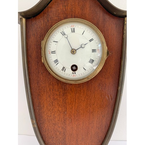 299 - Vintage Brass And Wood Mantel Clock On Brass Ball Feet
17 x 7.5 x 25 cms h