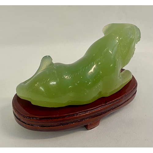 211 - Oriental  Green Jade Foo Dog Figure Raised on Wooden Base 10cm x 7cm