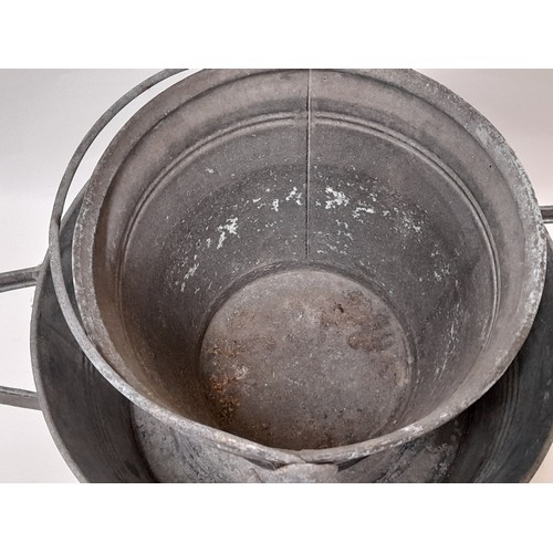 141 - Galvanised Bucket with swing handle and a Galvanised 2 handled Bowl, 42cm dimeter