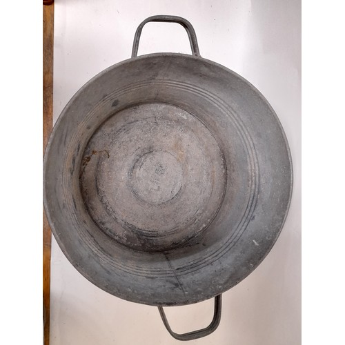 141 - Galvanised Bucket with swing handle and a Galvanised 2 handled Bowl, 42cm dimeter