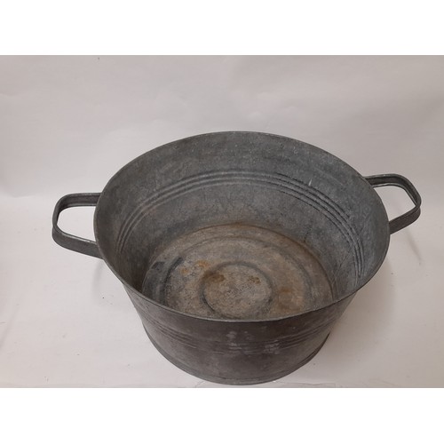 145 - 2 x Galvanised 2 handled Bowls, largest 40cm diameter