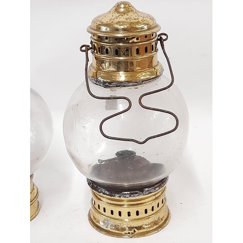 302 - Two Vintage Brass and Onion Glass Hanging Oil lamps, tallest  29cm high. (2)