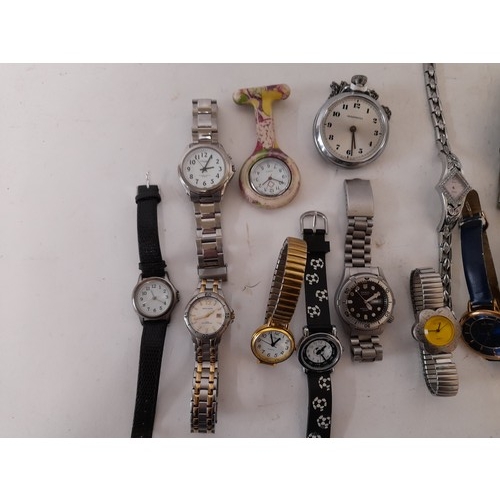 246 - Quantity of vintage watches in a vintage Sweet Tin