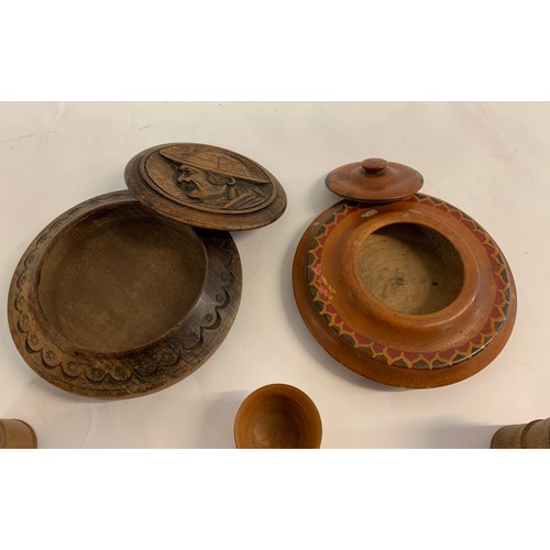 208 - 2 x Carved Wooden Lidded Circular Boxes Together With 3 Vintage Wooden Dice Tumblers
Both Boxes 17 c... 