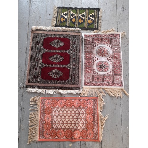 335 - 4 x Small Rugs, largest 55cm x 47cm