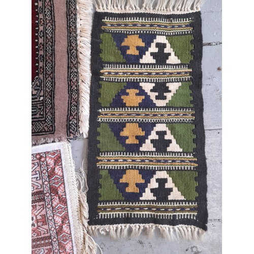 335 - 4 x Small Rugs, largest 55cm x 47cm