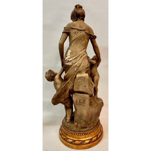 381 - Terracotta Statue of lady with two children Signed To Reverse. 47cm x 23cm.