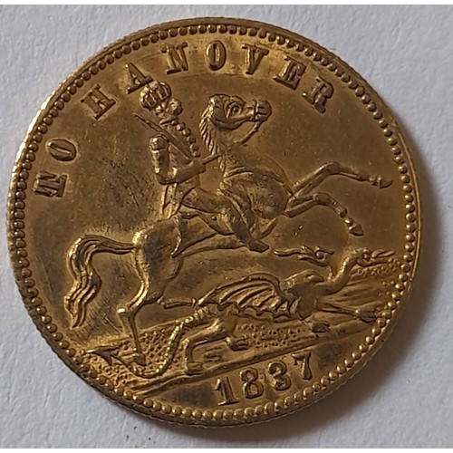 349 - Gold coloured Coin