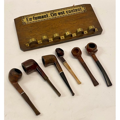 336 - Vintage Continental Wooden Brass Plaque Wall Hanging Pipe Holder and Six Pipes to Include Santa Fee ... 