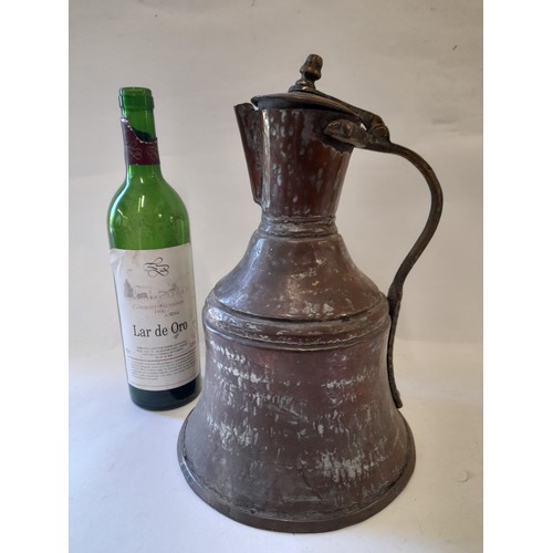 477 - Moroccan copper jug with lid 32cm high