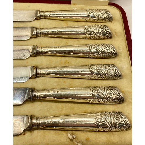 265 - A Set of Six Cross Bros. Hallmarked Silver Handled Butter with Decoration in Case. Weight 6.346 Oz