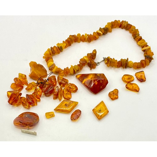 267 - A Collection of Vintage Amber Stones, Beads and Jewellery in Box