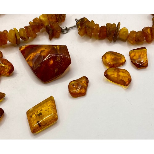 267 - A Collection of Vintage Amber Stones, Beads and Jewellery in Box