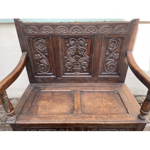 2 - Antique Carved Wood Settle, With Decorative Panels Along With Storage . 100 x 57 x 115 cms