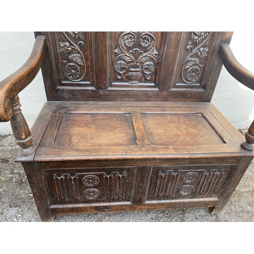 2 - Antique Carved Wood Settle, With Decorative Panels Along With Storage . 100 x 57 x 115 cms