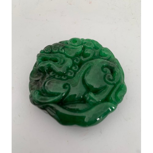 135 - Natural Green Jade Double Sided Qilin Amulet Pendant Having Dragon Motif
4.5 cms diameter