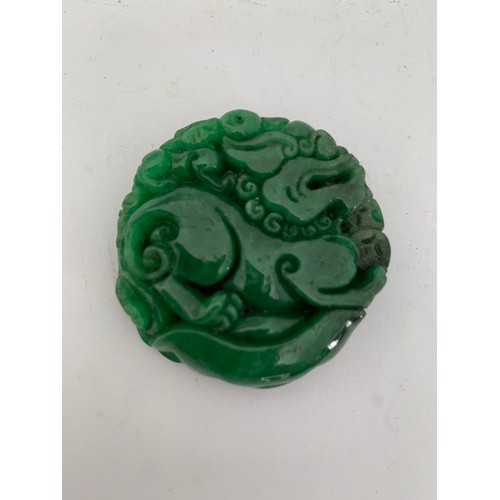 135 - Natural Green Jade Double Sided Qilin Amulet Pendant Having Dragon Motif
4.5 cms diameter