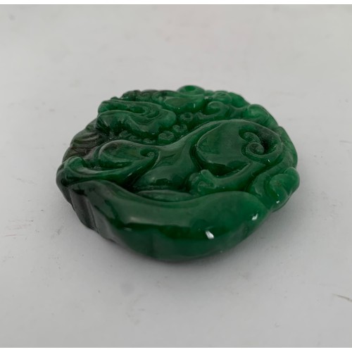 135 - Natural Green Jade Double Sided Qilin Amulet Pendant Having Dragon Motif
4.5 cms diameter