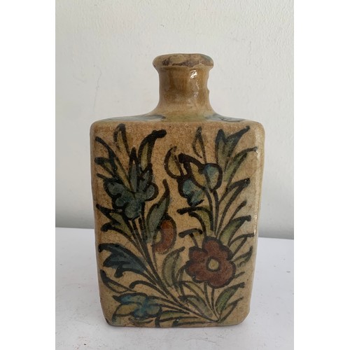 105 - Similar To Previous Lot
Vintage Floral Persian Qajar Pottery Tea Flask
10 x 10 x 18 cms h