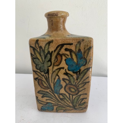 105 - Similar To Previous Lot
Vintage Floral Persian Qajar Pottery Tea Flask
10 x 10 x 18 cms h