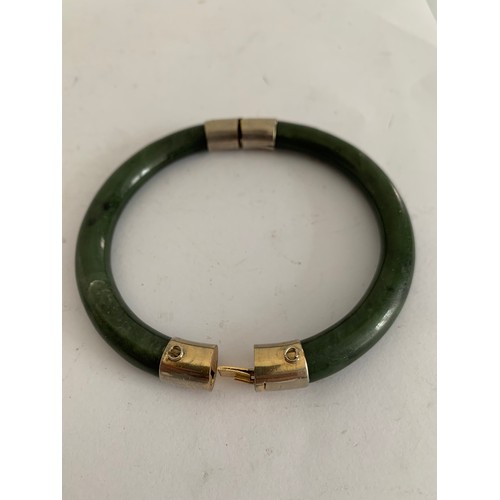 288 - Vintage Chinese Mottled Green Jade Hinged Bangle 
8 cms diameter