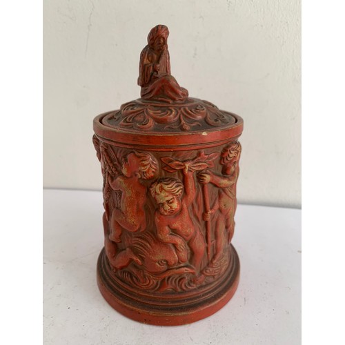 103 - Antique Terracotta Tobacco Jar Featuring Winged Cherubs And Having A Finial In The Form Of A Seated ... 