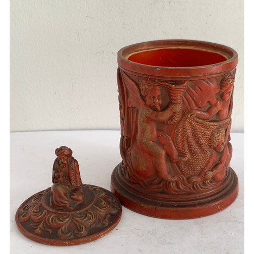 103 - Antique Terracotta Tobacco Jar Featuring Winged Cherubs And Having A Finial In The Form Of A Seated ... 