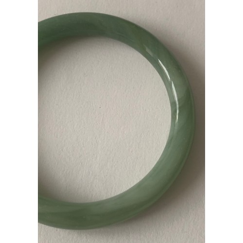 289 - Vintage Chinese Jade Bangle
8 cms diameter