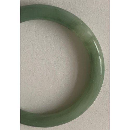 289 - Vintage Chinese Jade Bangle
8 cms diameter