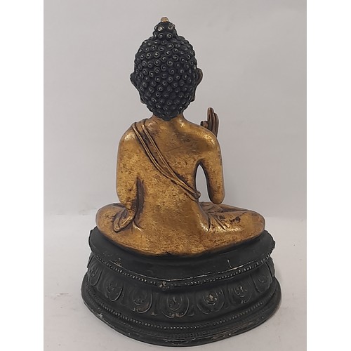 303 - Gilt Composite Seated Buddha, 23cm high