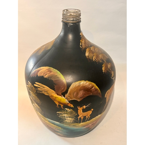 406 - Large Glass Carboy /  Demi John  with scenes  of wildlife and animals painted around. 53cm x 38cm.