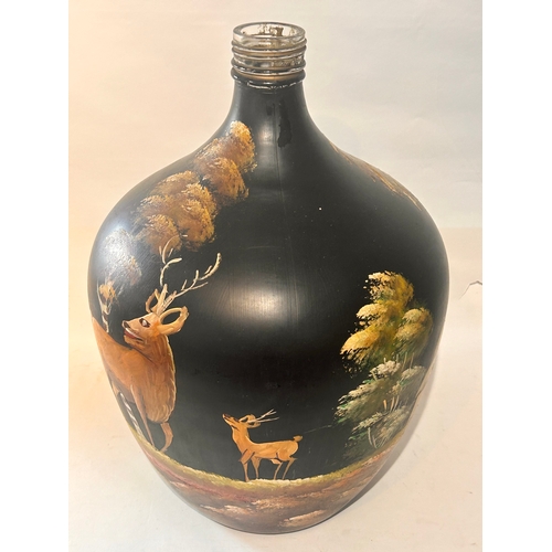 406 - Large Glass Carboy /  Demi John  with scenes  of wildlife and animals painted around. 53cm x 38cm.