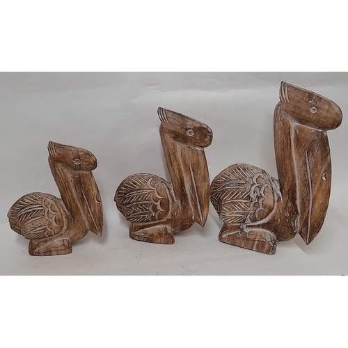 372 - 3 x wood carved graduated Pelican Figures , largest 30cm high