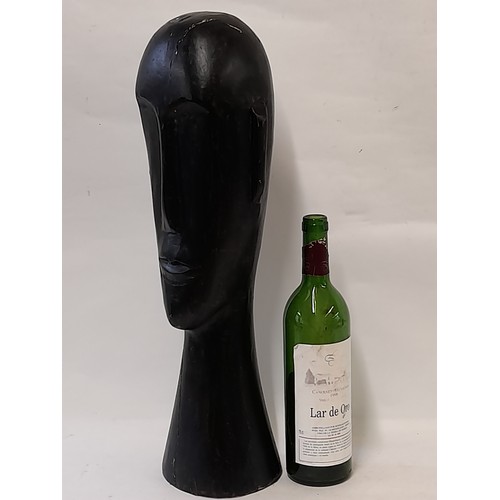 380 - Contemporary style carved Head painted Black, 52cm high