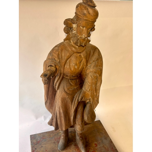 432 - Large Antique Carved Wood Figure Raised On A Later Base With Traces Of Paint. 87m x 44cm x 32cm.